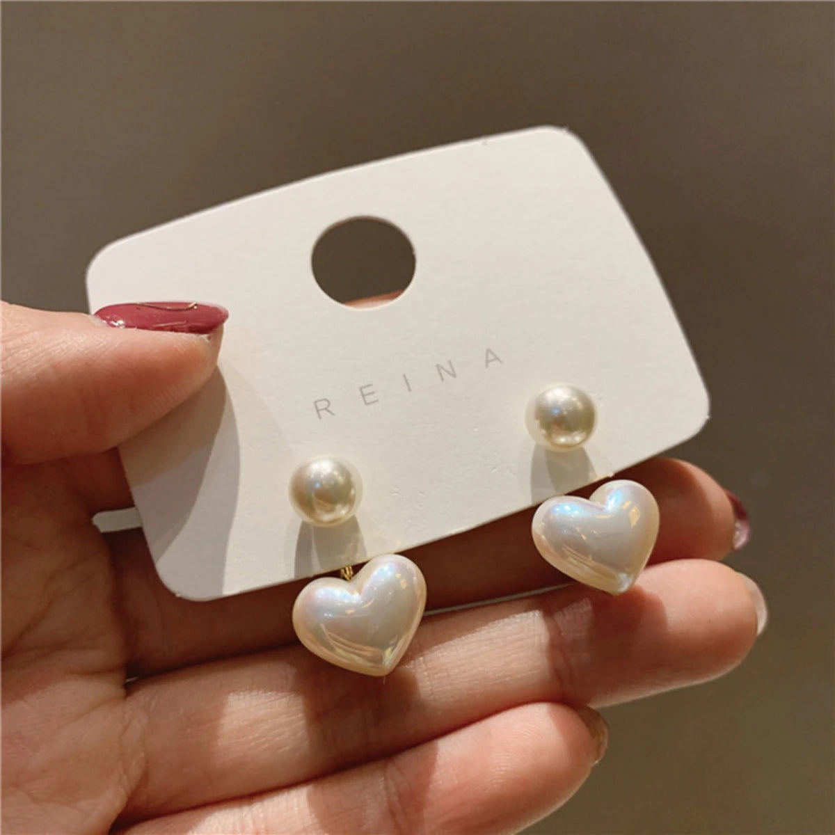 Lady Love Pearl Cold Wind Earrings
